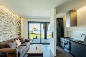 A kitchen or kitchenette at Acquarella Resort Suite