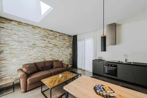 A kitchen or kitchenette at Acquarella Resort Suite