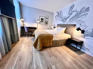 Postel nebo postele na pokoji v ubytování Hotel Ambiente