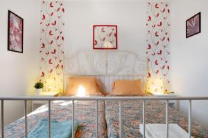 A bed or beds in a room at Casa Drago, Belleza y Tranquilidad