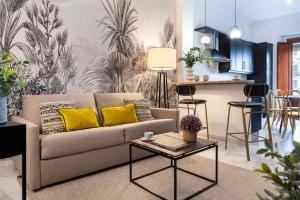 Posezení v ubytování Hernando Colón Suite Apartments
