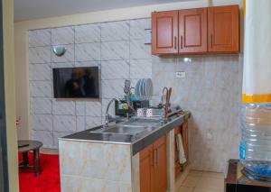 Kuhinja oz. manjša kuhinja v nastanitvi Cassabella Apartment, Opposite Metropark Hotel + 8 fotografij