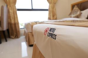 Hotel Express客房内的一张或多张床位