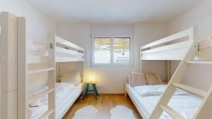 Postel nebo postele na pokoji v ubytování Sublime modern family apartment of 2 bedrooms