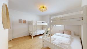 Postel nebo postele na pokoji v ubytování Sublime modern family apartment of 2 bedrooms