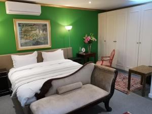 Llit o llits en una habitació de Table Mountain Cottage