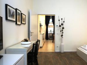 A bed or beds in a room at Flatprovider Comfort Eduard Apartment - contactless check in