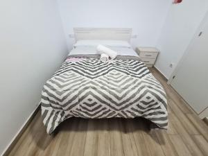 Letto o letti in una camera di Atico Completo Jaime I