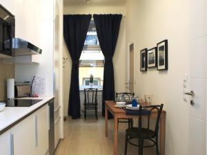 A kitchen or kitchenette at Flatprovider Comfort Eduard Apartment - contactless check in