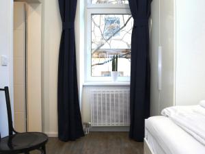 A bed or beds in a room at Flatprovider Comfort Eduard Apartment - contactless check in