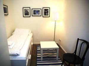 A bed or beds in a room at Flatprovider Comfort Eduard Apartment - contactless check in