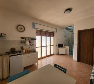 Кухня или кухненски бокс в Villa Nicole - Spazio Cielo -Punta Prosciutto