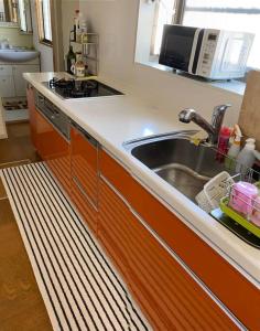 Η κουζίνα ή μικρή κουζίνα στο Amitie Villa