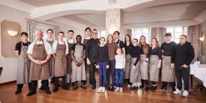 a group of people posing for a picture in a room at Mühlenhelle in Gummersbach