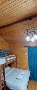 Katil atau katil-katil dalam bilik di Guesthouse and Cottage Nicolo