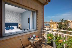 Rõdu või terrass majutusasutuses Bloom Hotel Rome