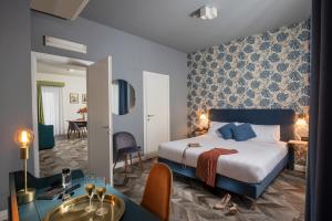 Voodi või voodid majutusasutuse Bloom Hotel Rome toas
