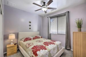 a bedroom with a bed and a ceiling fan at Bellemont Home about 12 Mi to Flagstaff! in Bellemont