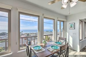 a dining room with a table and views of the ocean at Pet-Friendly Cayucos Home with Ocean Views! in Cayucos