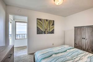 a bedroom with a bed and a dresser and a window at Pet-Friendly Cayucos Home with Ocean Views! in Cayucos