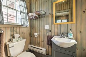 a bathroom with a toilet and a sink at Killingly Barnyard Studio in Wine Country! 
