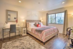 a bedroom with a bed and a desk and a window at Serene Condo Near Park City Resort! in Park City +24 photos