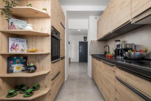 Kuchyňa alebo kuchynka v ubytovaní Apartman Arba