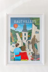 ein gerahmtes Bild eines Posters von huiliers in der Unterkunft Superbe studio 'Chardonnay' avec vue sur la vallée in Hautvillers
