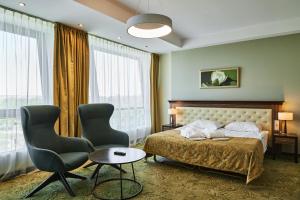Postel nebo postele na pokoji v ubytování Grand SPA Lietuva Hotel Lietuva