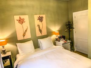 Postel nebo postele na pokoji v ubytování Hotel Beijers
