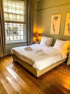 Postel nebo postele na pokoji v ubytování Hotel Beijers