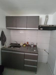 Una cocina o kitchenette en Departamentos Patico