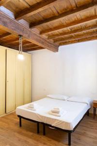 Ein Bett oder Betten in einem Zimmer der Unterkunft Sweet Apartment Near Piazza Pitti