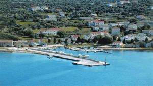 an aerial view of a harbor with boats in the water at Holiday Home Olib in Olib