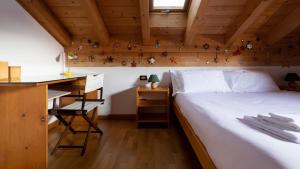 Ένα ή περισσότερα κρεβάτια σε δωμάτιο στο Italianway - Roma 23