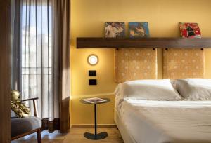 Posteľ alebo postele v izbe v ubytovaní Hotel Jolly Roger