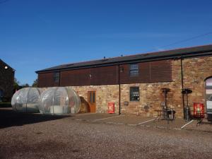 a building with two domes on the side of it at John Collingwood, Bowness-on-Solway in Bowness-on-Solway