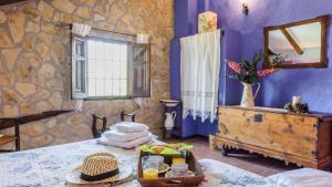Posteľ alebo postele v izbe v ubytovaní Combinación Cortijo y Mirador Casablanca Priego de Córdoba by Ruralidays