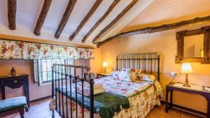 Posteľ alebo postele v izbe v ubytovaní Combinación Cortijo y Mirador Casablanca Priego de Córdoba by Ruralidays