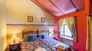 Posteľ alebo postele v izbe v ubytovaní Combinación Cortijo y Mirador Casablanca Priego de Córdoba by Ruralidays