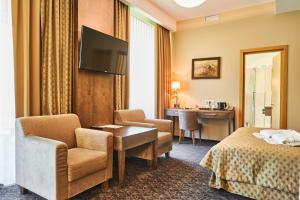 TV a/nebo společenská místnost v ubytování Grand SPA Lietuva Hotel Druskininkai