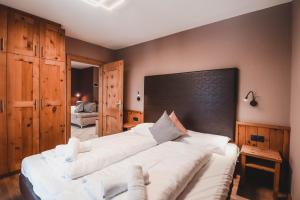 Postel nebo postele na pokoji v ubytování Residence Montani