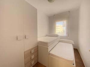 Posteľ alebo postele v izbe v ubytovaní R133 Apartamento de la Riba