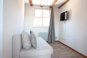 Televízia a/alebo spoločenská miestnosť v ubytovaní Travel Homes - Tanneur 7, just next to Little Venice + 8 fotografií