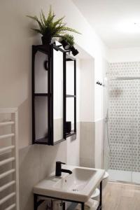 A bathroom at IM Apartments - Appartamento in zona Piazza Repubblica - Centrale