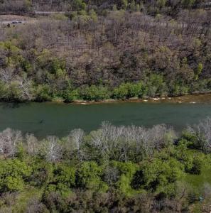 an aerial view of a river with trees and a forest at Cozy Cabin w/ Indoor Fireplace & Tranquil views in Luray