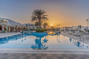 Bazén v ubytování Hydramis Palace Beach Resort nebo v jeho okolí