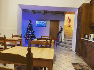 a kitchen with a christmas tree in a room at Residenza Matilde in Fiumefreddo Bruzio