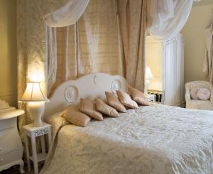 Postel nebo postele na pokoji v ubytování Maranatha Country House + 26 fotografií