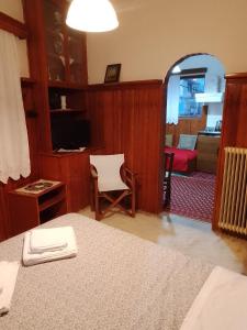 Posteľ alebo postele v izbe v ubytovaní Arka Metsovo
